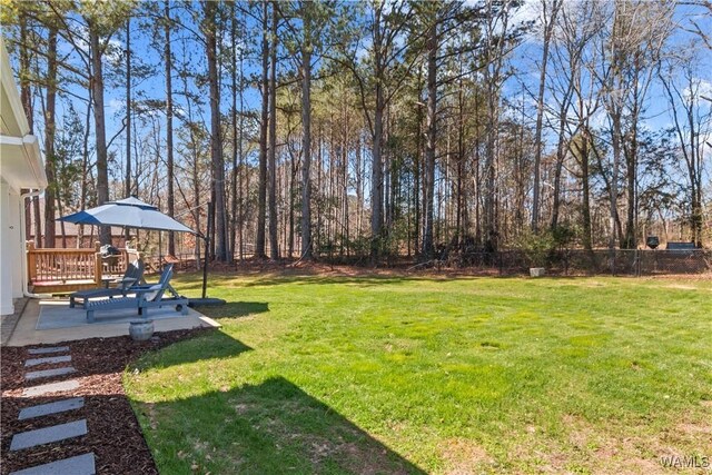 view of yard featuring a patio area and fence