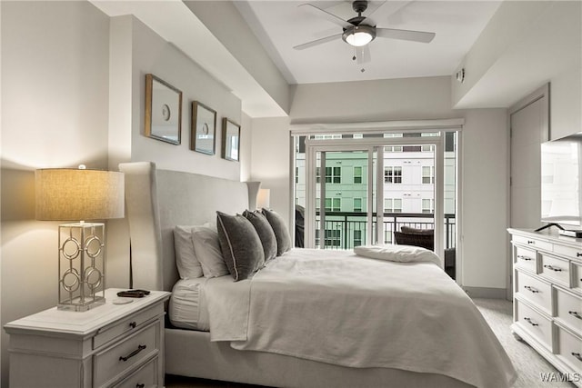 bedroom featuring light carpet, access to exterior, ceiling fan, and baseboards