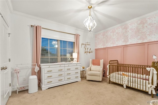 13862 Willow View Ln, Northport, AL 35475 - bedroom with a chandelier, light carpet, a crib, ornamental molding, and a wainscoted wall