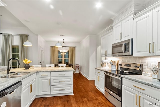 13862 Willow View Ln, Northport, AL 35475 - kitchen featuring stainless steel appliances, backsplash, dark wood finished floors, white cabinets, and light stone counters