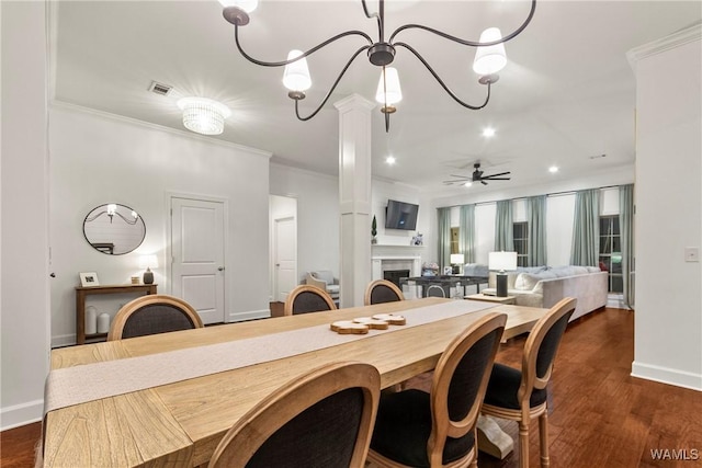 13862 Willow View Ln, Northport, AL 35475 - dining space with a tile fireplace, a ceiling fan, crown molding, dark wood-style flooring, and recessed lighting