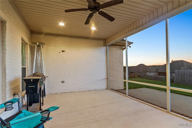 13862 Willow View Ln, Northport, AL 35475 - patio terrace at dusk featuring a patio and ceiling fan