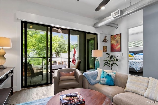 1038 14th Ave Unit B, Tuscaloosa, AL 35401 - living area featuring a ceiling fan and wood finished floors