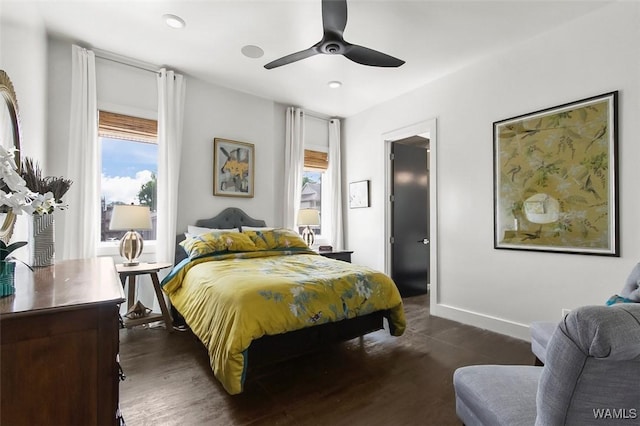 1038 14th Ave Unit B, Tuscaloosa, AL 35401 - bedroom with dark wood finished floors, multiple windows, ceiling fan, and recessed lighting