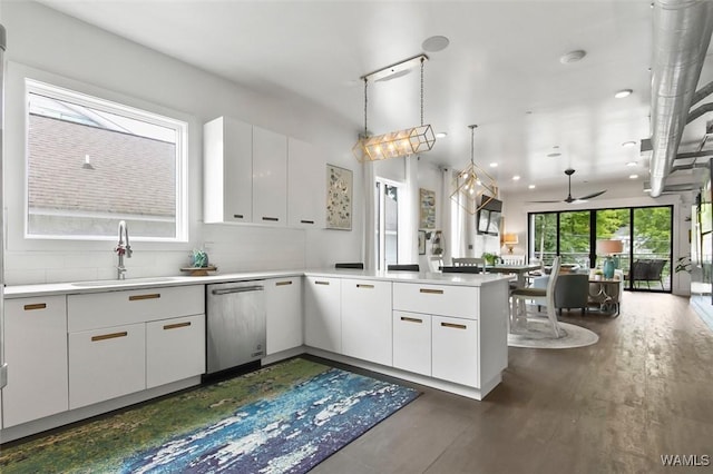 1038 14th Ave Unit B, Tuscaloosa, AL 35401 - kitchen with a sink, dishwasher, a peninsula, a ceiling fan, and white cabinets