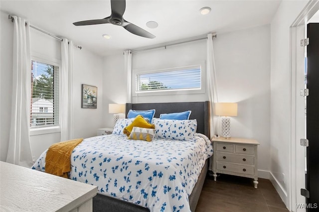 1038 14th Ave Unit B, Tuscaloosa, AL 35401 - bedroom featuring multiple windows, baseboards, ceiling fan, dark tile patterned floors, and recessed lighting