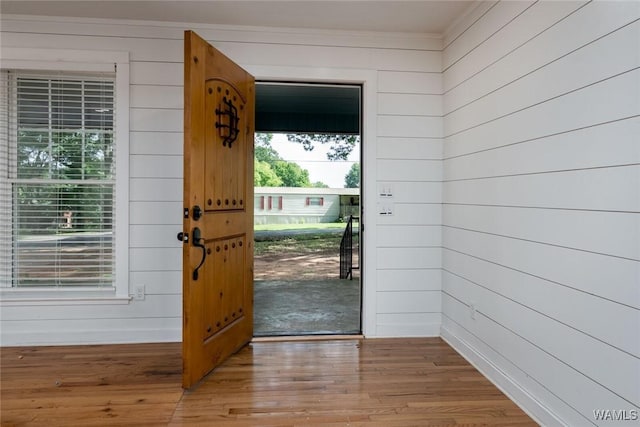 11376 Kings Loop Rd, Tuscaloosa, AL 35405 - foyer entrance with wood walls, wood finished floors, plenty of natural light, and crown molding