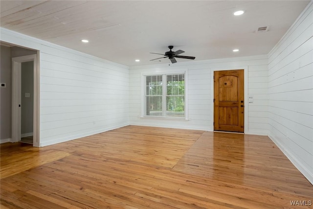 11376 Kings Loop Rd, Tuscaloosa, AL 35405 - unfurnished room with wood finished floors, ornamental molding, ceiling fan, wooden walls, and recessed lighting