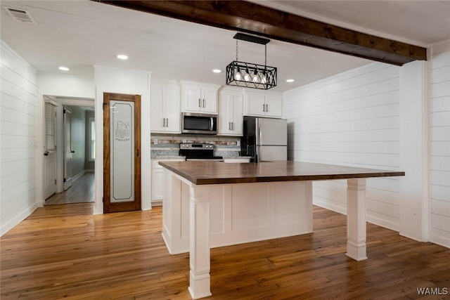 11376 Kings Loop Rd, Tuscaloosa, AL 35405 - kitchen featuring stainless steel appliances, white cabinets, beam ceiling, butcher block counters, and light wood-style flooring