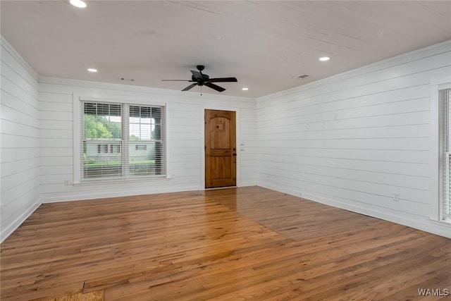 11376 Kings Loop Rd, Tuscaloosa, AL 35405 - spare room featuring wood finished floors, recessed lighting, wooden walls, ceiling fan, and crown molding