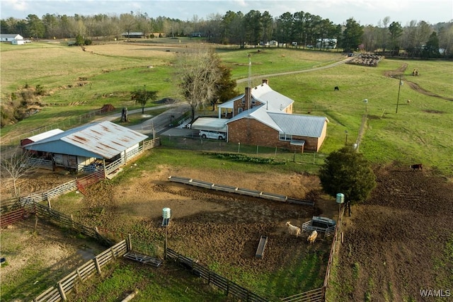 birds eye view of property featuring a rural view