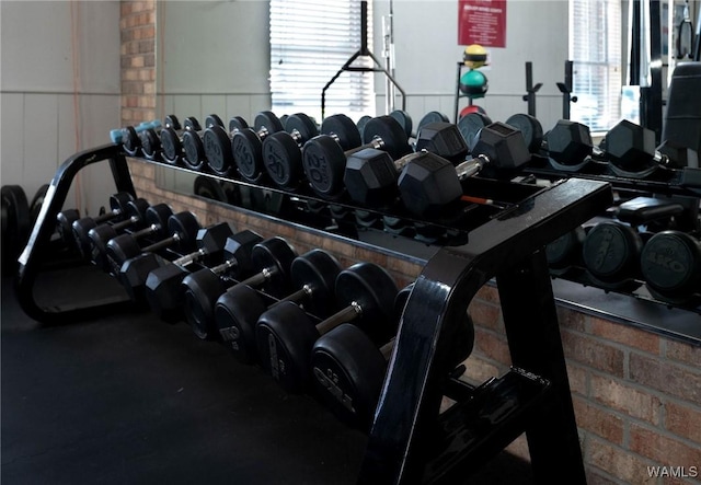 workout area with wainscoting