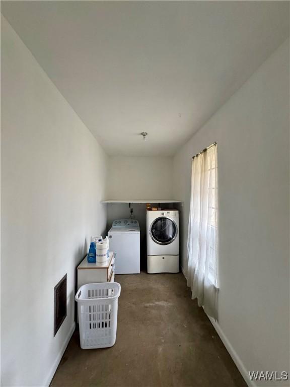 laundry area featuring washing machine and dryer