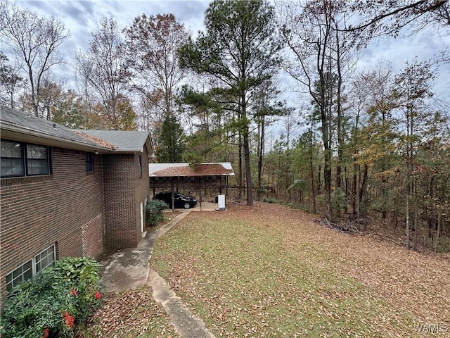 view of yard featuring a carport