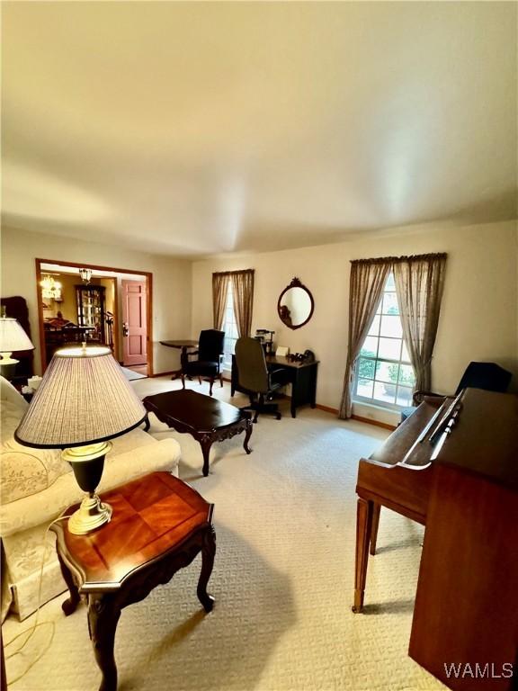 living room with light colored carpet