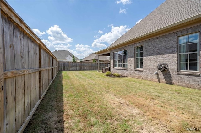 view of yard featuring a fenced backyard