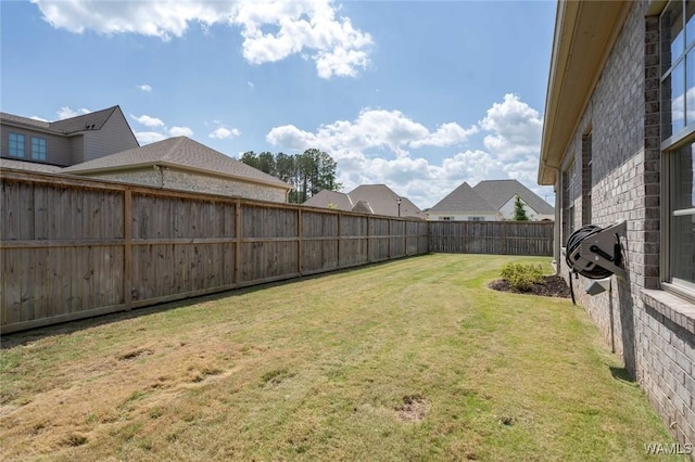 view of yard featuring a fenced backyard