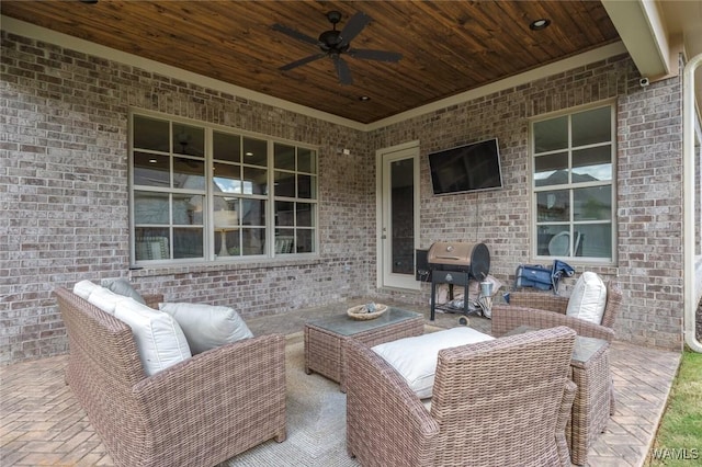 view of patio featuring ceiling fan, outdoor lounge area, and a grill