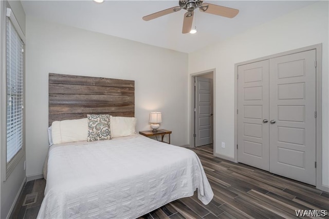 702 Gene Stallings Ave, Tuscaloosa, AL 35401 - bedroom with visible vents, a ceiling fan, wood finished floors, a closet, and baseboards