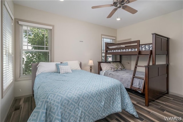 702 Gene Stallings Ave, Tuscaloosa, AL 35401 - bedroom featuring visible vents, a ceiling fan, baseboards, and wood finished floors