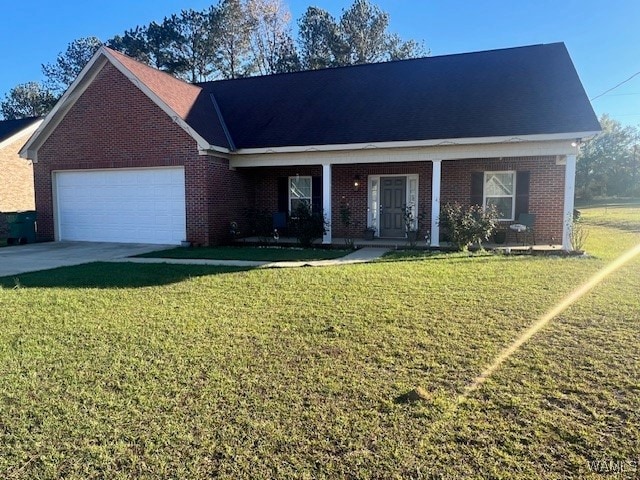 view of front of home featuring a garage and a front lawn