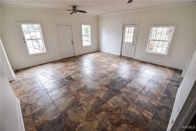 entryway with crown molding, a textured ceiling, and ceiling fan