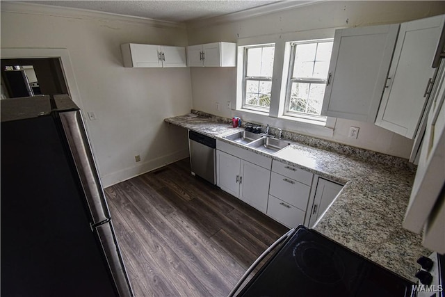 kitchen with sink, white cabinetry, ornamental molding, appliances with stainless steel finishes, and dark hardwood / wood-style flooring