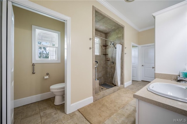 bathroom with vanity, tile patterned floors, crown molding, toilet, and walk in shower