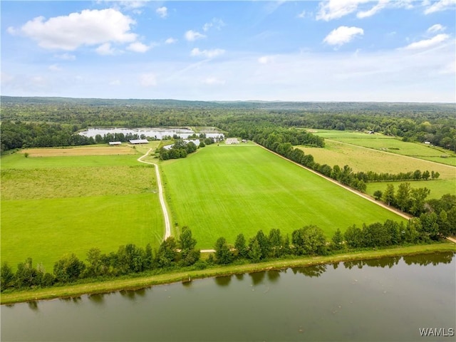 drone / aerial view featuring a water view and a rural view