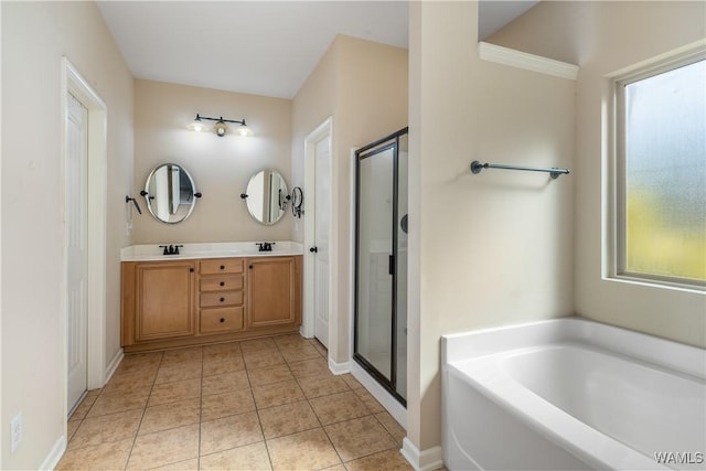 bathroom featuring double vanity, a stall shower, a bath, and tile patterned floors