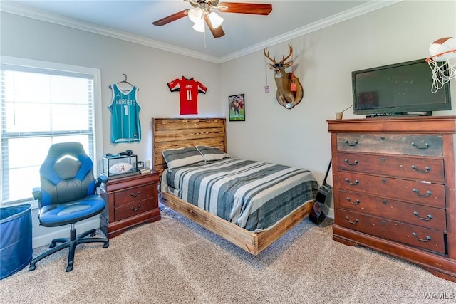 carpeted bedroom featuring multiple windows, ceiling fan, and ornamental molding