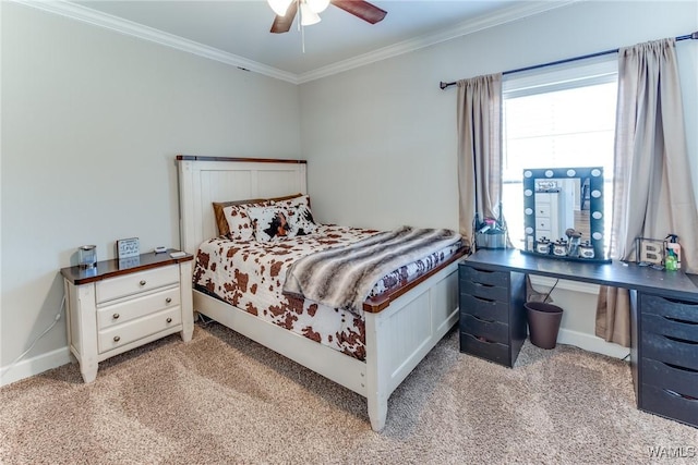 carpeted bedroom with ceiling fan and crown molding