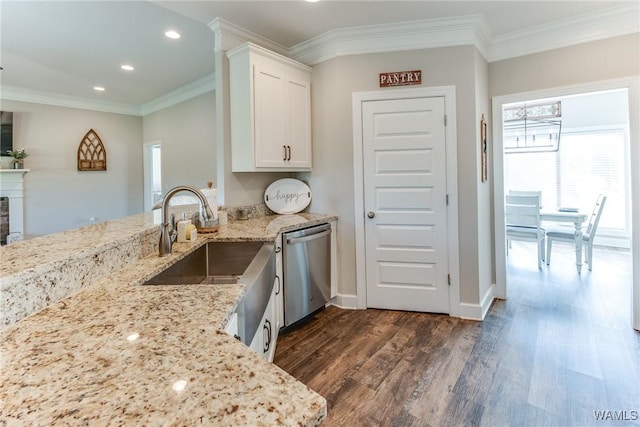 kitchen featuring sink, white cabinetry, stainless steel dishwasher, and light stone counters