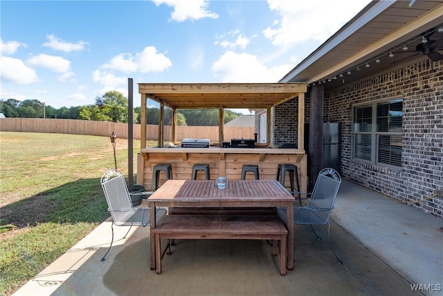 view of patio featuring a bar