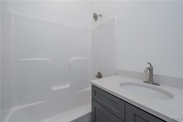 bathroom featuring vanity and shower / bathtub combination