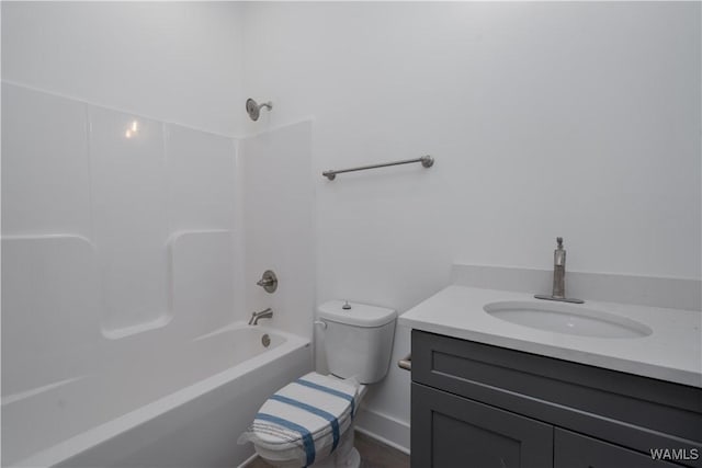 full bathroom featuring toilet, vanity, and shower / tub combination