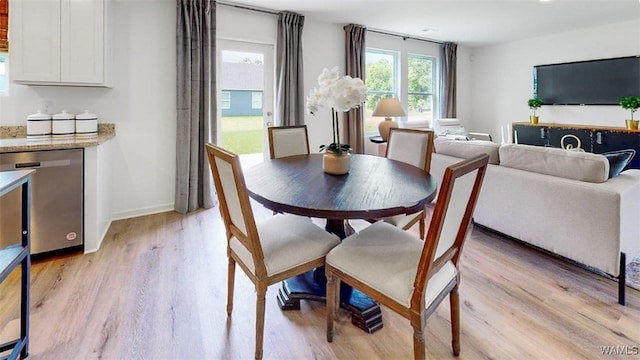 dining room with light hardwood / wood-style flooring