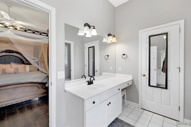 bathroom featuring tile patterned floors and vanity