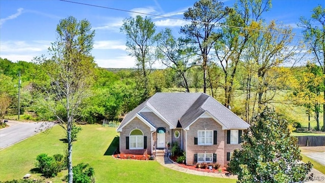 view of front of home with a front yard