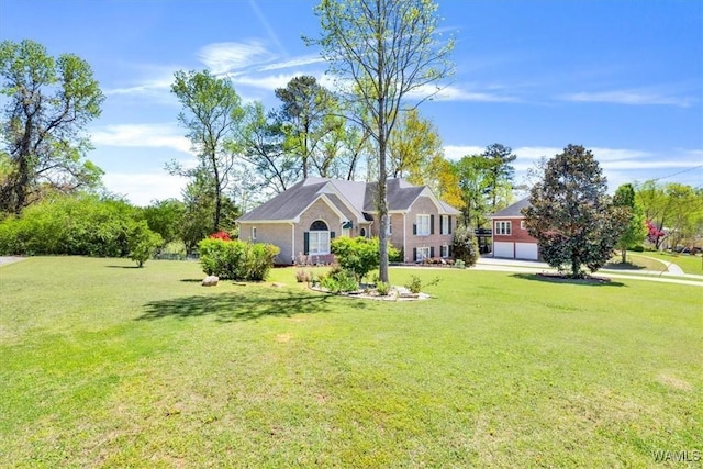 single story home with a front lawn and a garage