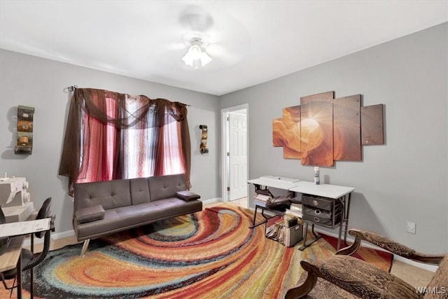 living room featuring ceiling fan