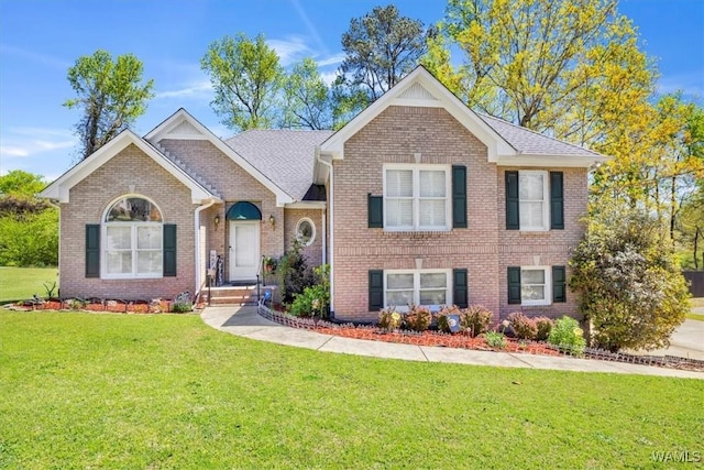 view of front of house with a front lawn