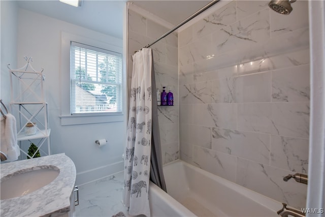 bathroom featuring vanity and shower / tub combo with curtain