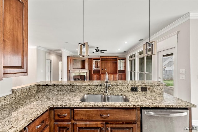 kitchen featuring light stone counters, ceiling fan, crown molding, sink, and dishwasher