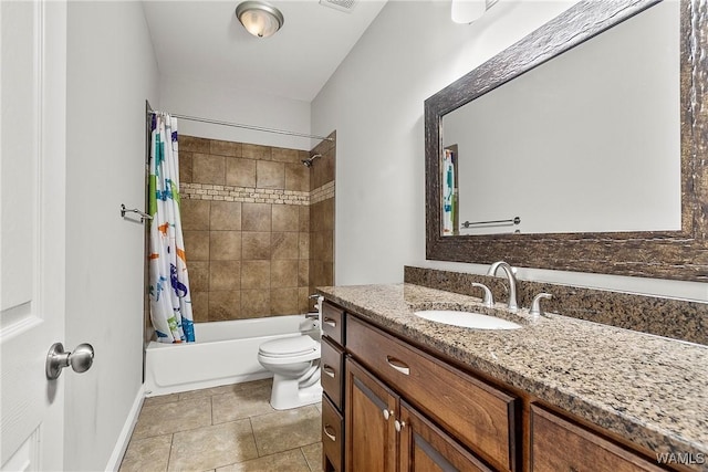 full bathroom featuring tile patterned flooring, vanity, toilet, and shower / bath combo with shower curtain