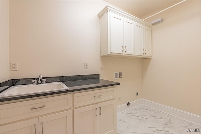 890 Founders St, Tuscaloosa, AL 35406 - laundry room featuring cabinet space, washer hookup, light marble finish flooring, hookup for an electric dryer, and hookup for a gas dryer