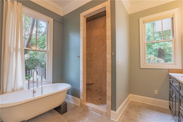 890 Founders St, Tuscaloosa, AL 35406 - full bathroom with crown molding, a soaking tub, vanity, healthy amount of natural light, and a tile shower