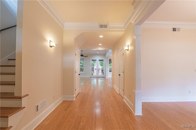890 Founders St, Tuscaloosa, AL 35406 - hall with stairs, light wood finished floors, crown molding, and recessed lighting