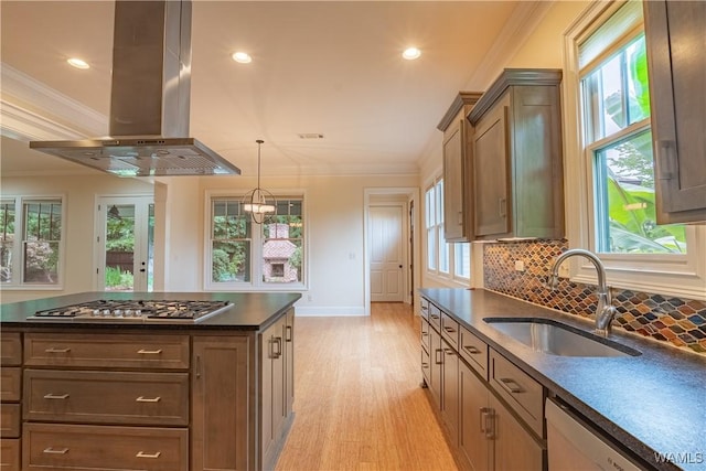 890 Founders St, Tuscaloosa, AL 35406 - kitchen with island range hood, stainless steel gas cooktop, dark countertops, dishwasher, and crown molding