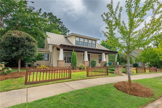 890 Founders St, Tuscaloosa, AL 35406 - view of front of property featuring a porch and a metal roof